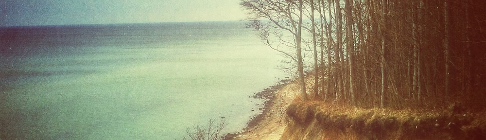 Two coast lines and a cross