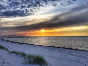 Sunset at sandy beach Heidkate.